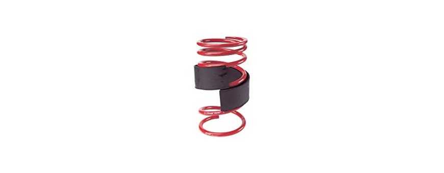 Spring travel limiters